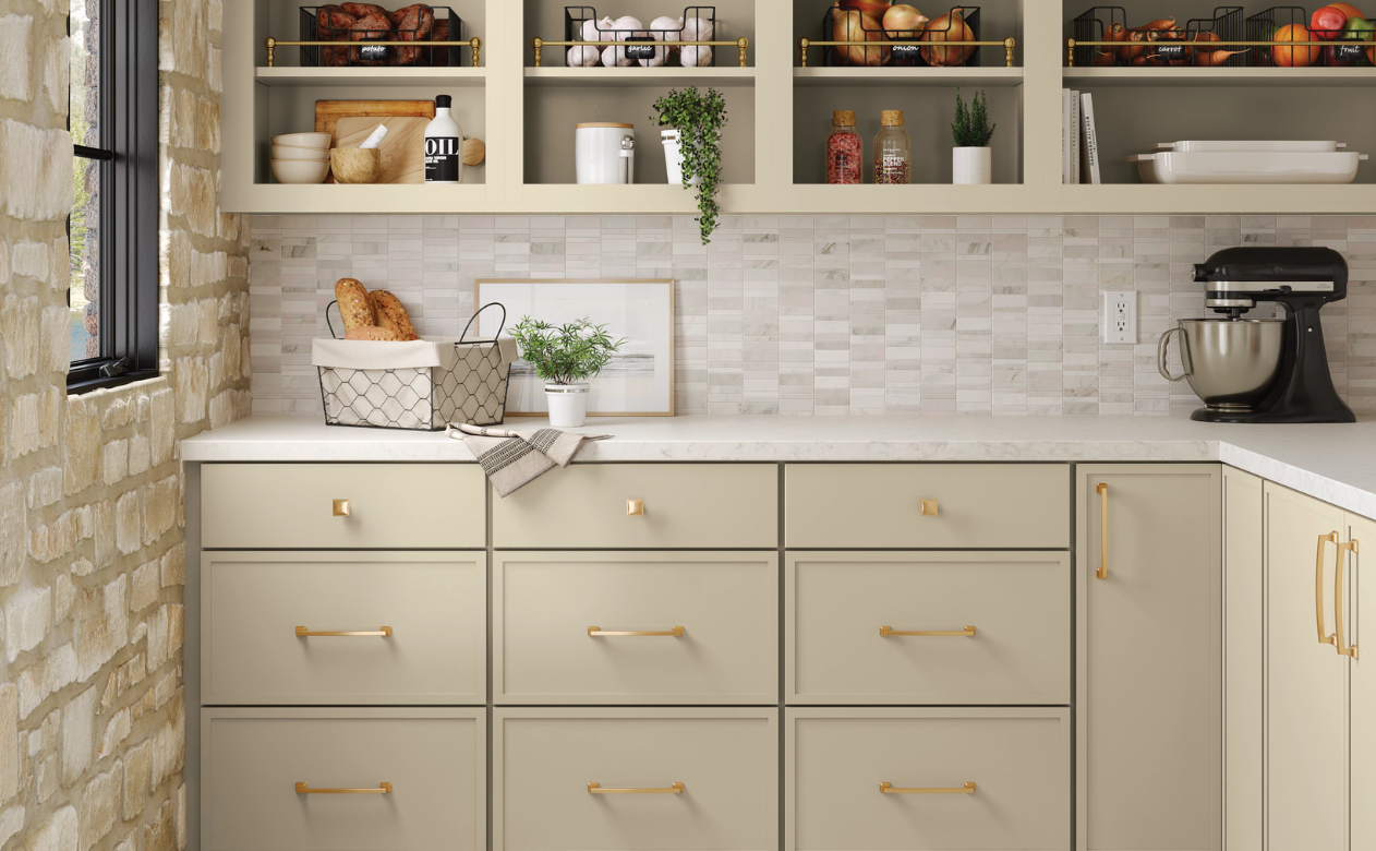 Brightly lit custom pantry with built-in cabinetry, display shelving, and organized storage for food