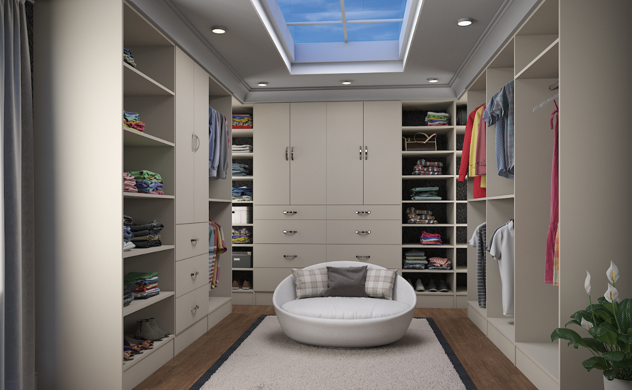 Organized walk-in closet with modular shelving, drawers, and hanging rods in neutral tones.