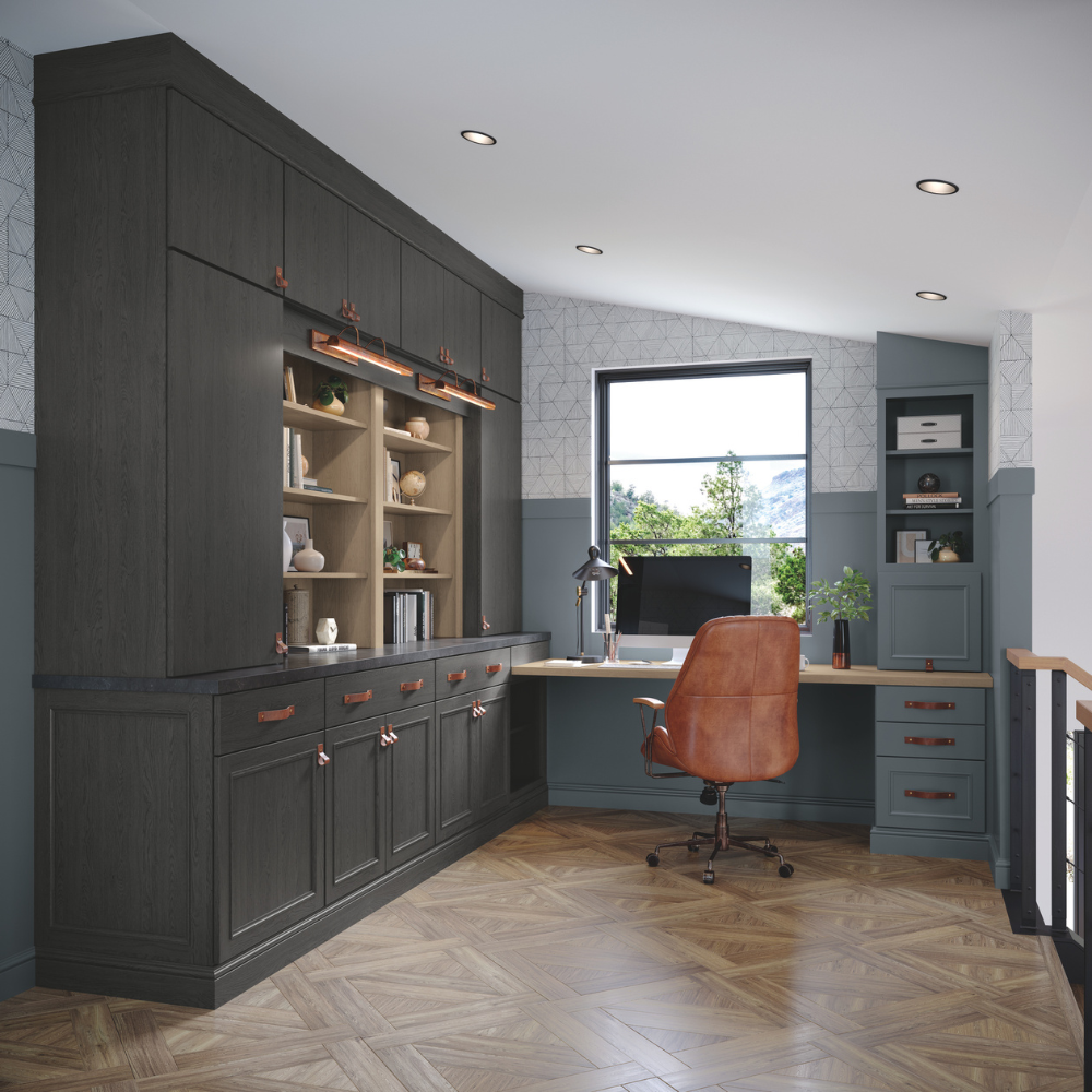 Home office with gray cabinets and leather desk chair